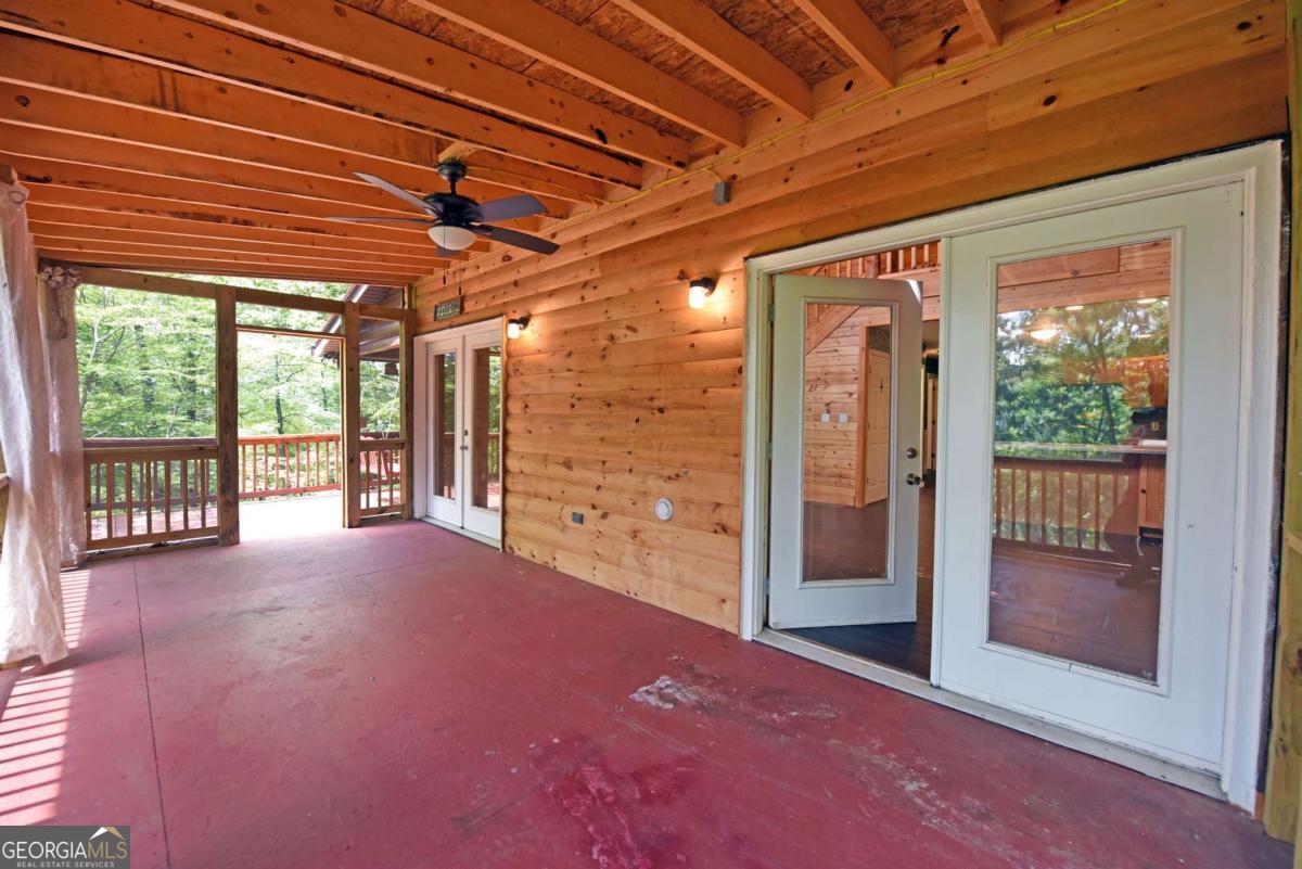 3373 Hardscrabble Road Mineral Bluff, GA 30559 - Photo 20 of 50 a view of empty room with floor to ceiling window