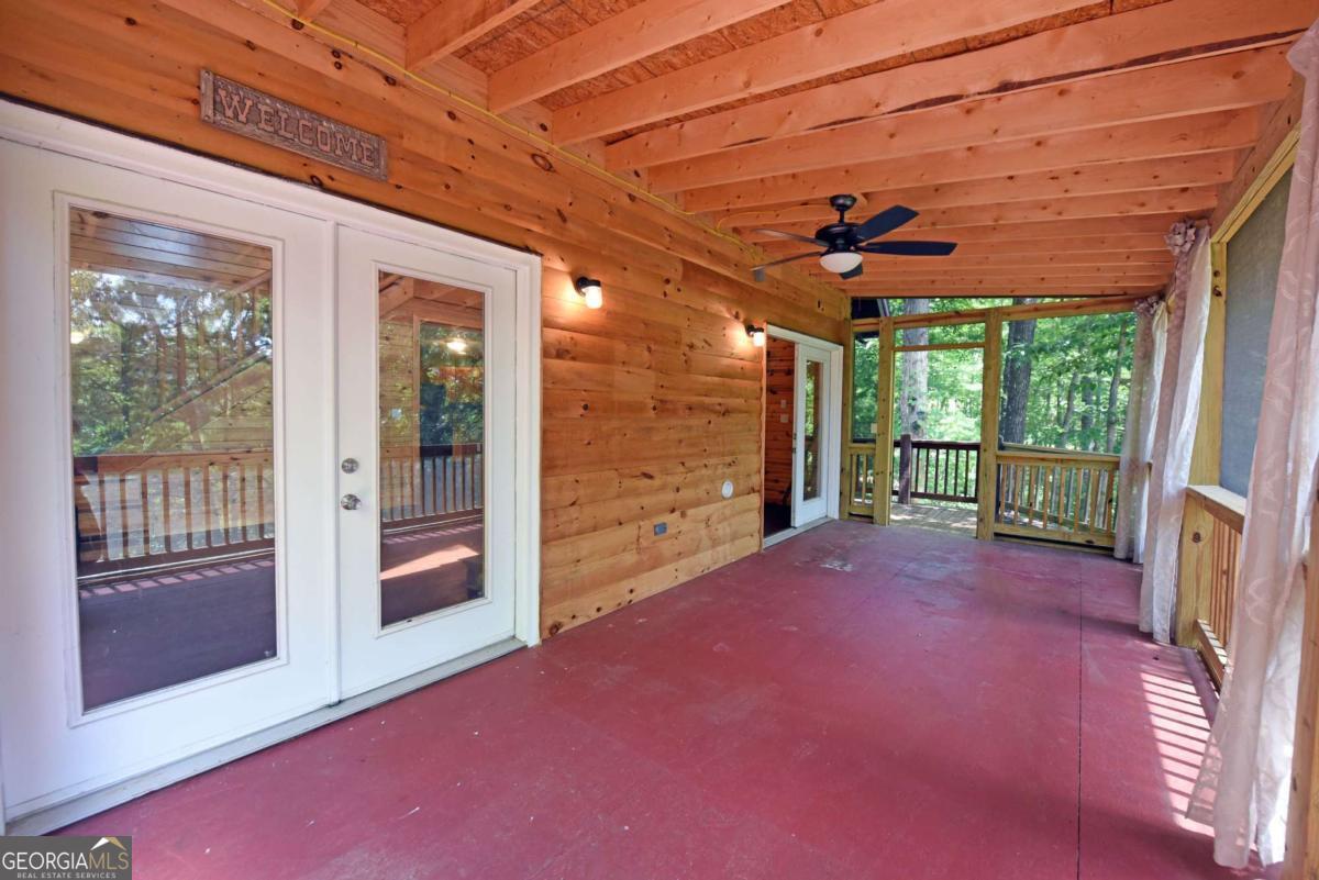 3373 Hardscrabble Road Mineral Bluff, GA 30559 - Photo 21 of 50 a view of a room with wooden floor and a table