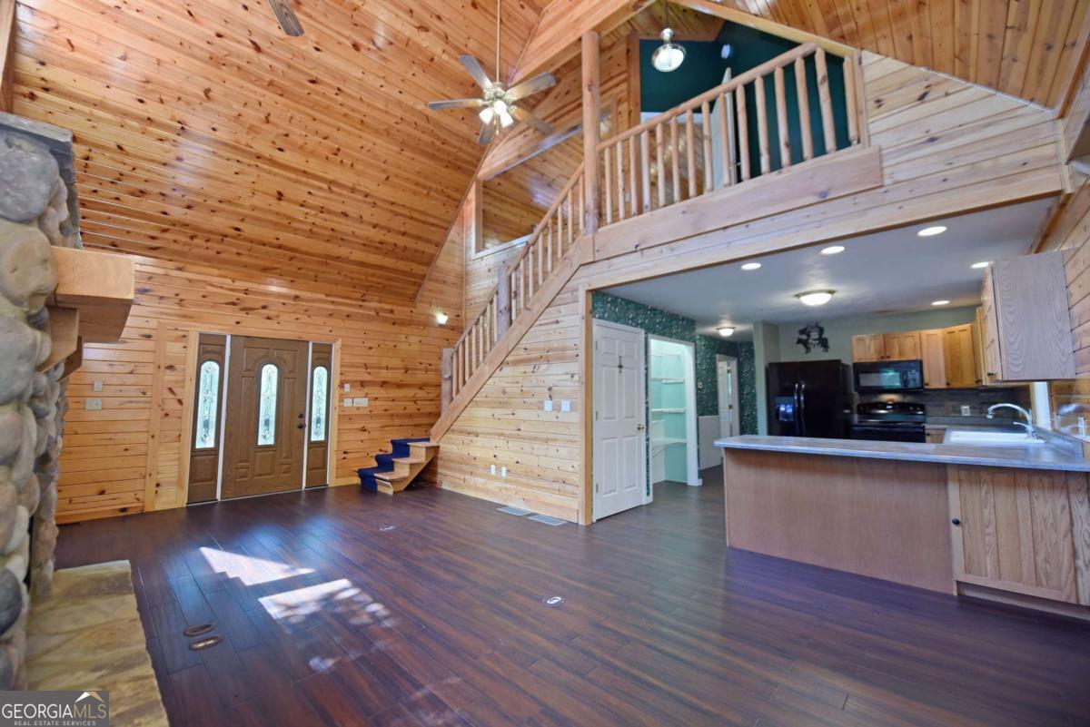 3373 Hardscrabble Road Mineral Bluff, GA 30559 - Photo 24 of 50 a view of a living room kitchen with a wooden floor