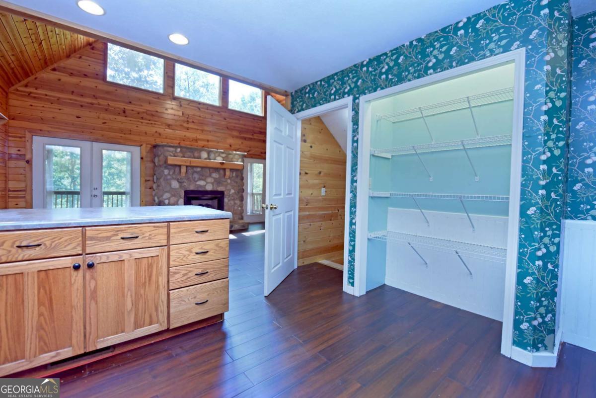 3373 Hardscrabble Road Mineral Bluff, GA 30559 - Photo 27 of 50 a kitchen with cabinets and wooden floor