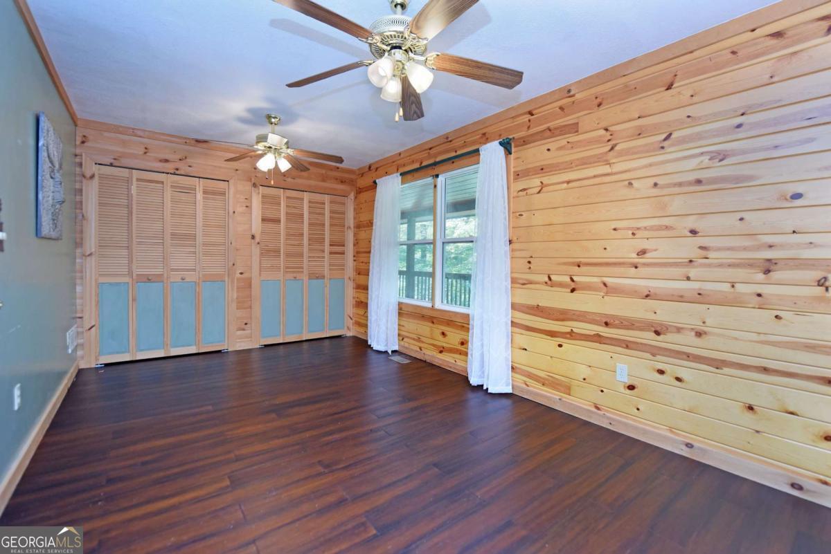 3373 Hardscrabble Road Mineral Bluff, GA 30559 - Photo 28 of 50 wooden floor in an empty room with a window