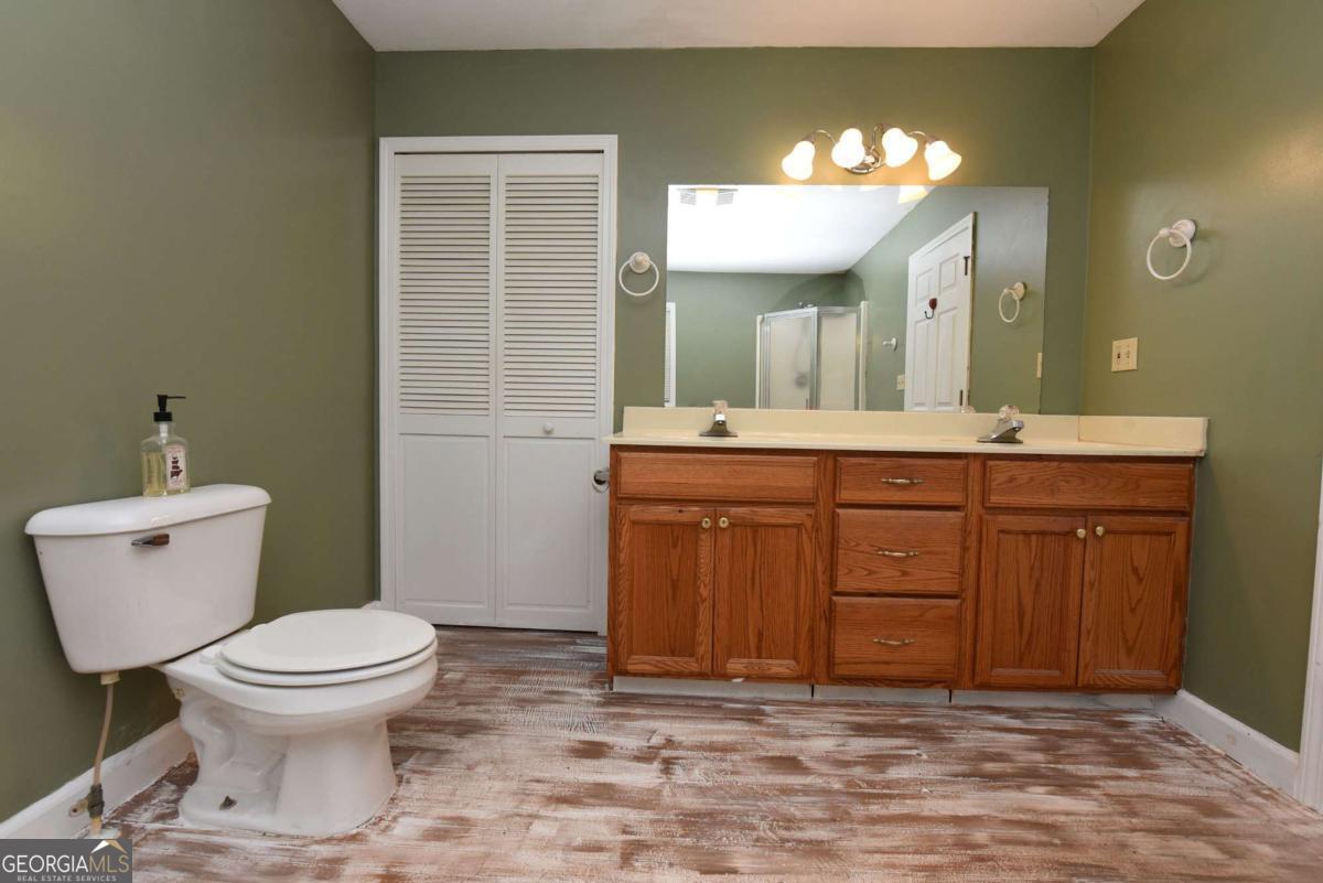 3373 Hardscrabble Road Mineral Bluff, GA 30559 - Photo 39 of 50 a bathroom with a sink and a mirror