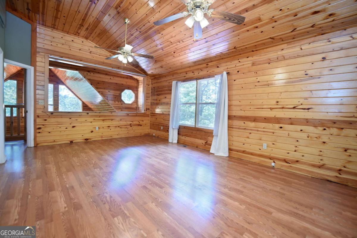 3373 Hardscrabble Road Mineral Bluff, GA 30559 - Photo 41 of 50 a view of an empty room with wooden floor