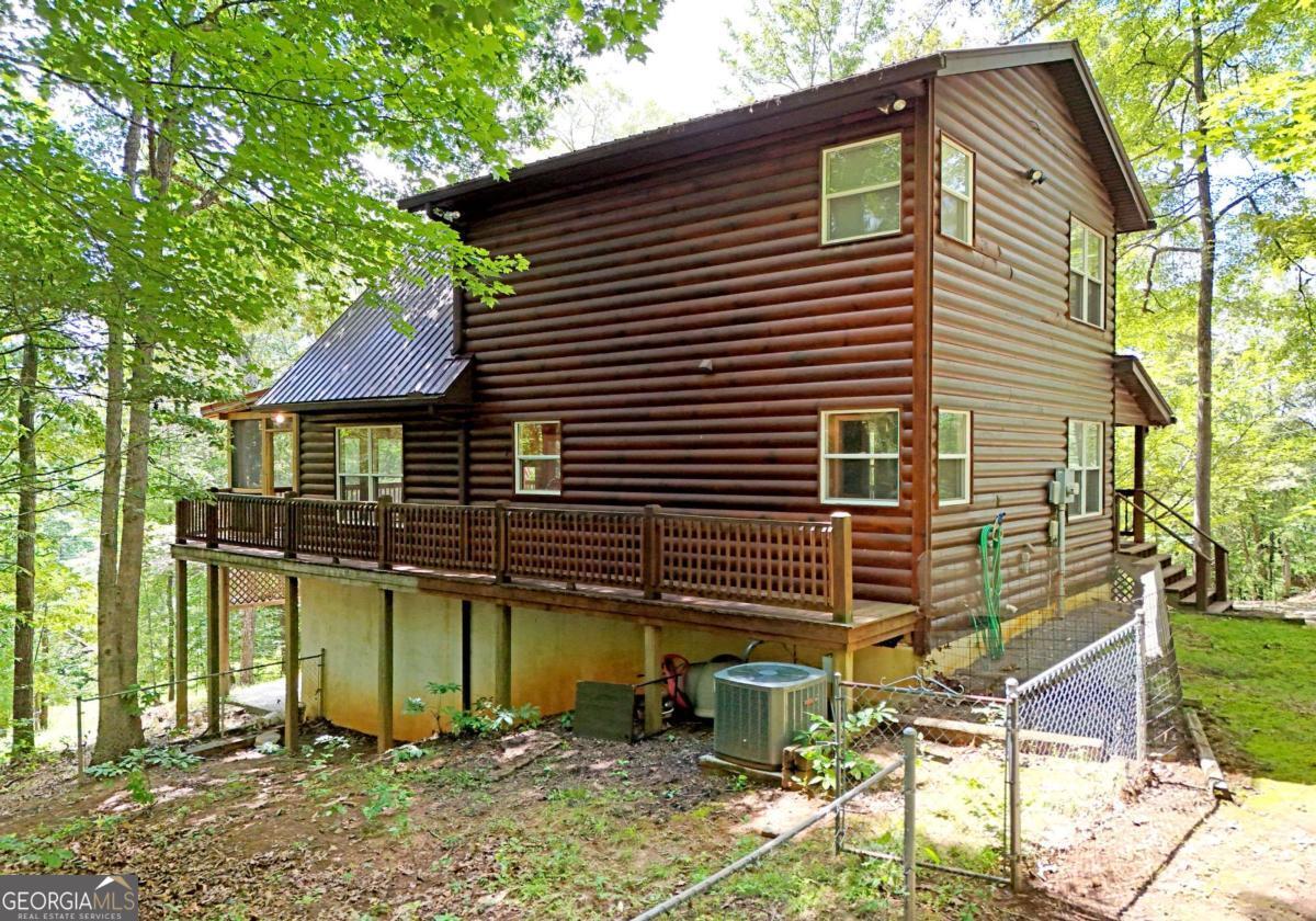3373 Hardscrabble Road Mineral Bluff, GA 30559 - Photo 8 of 50 a view of a house with a yard