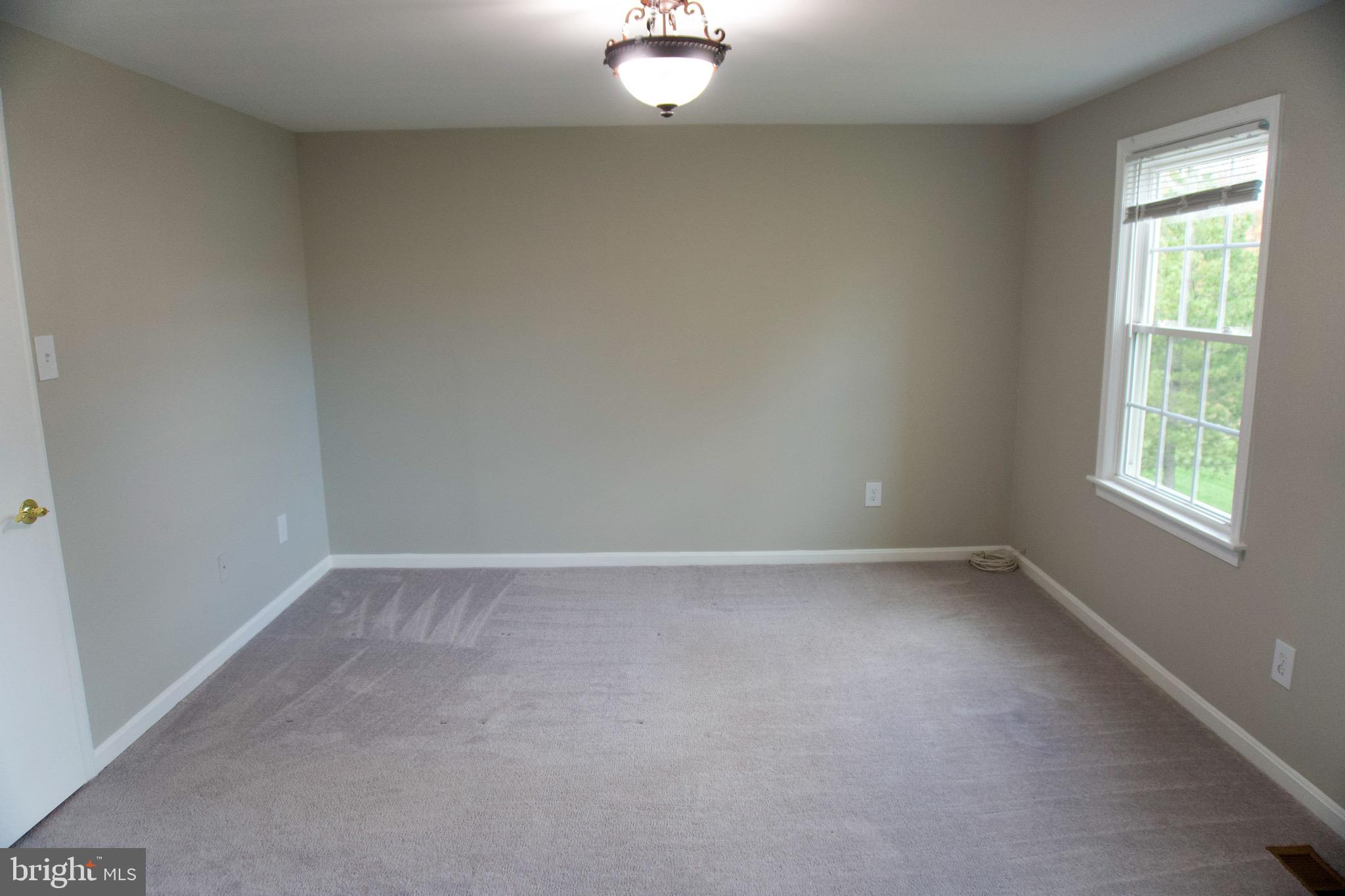 7341 Crestleigh Circle Alexandria, VA 22315 - Photo 15 of 21 an empty room with a window