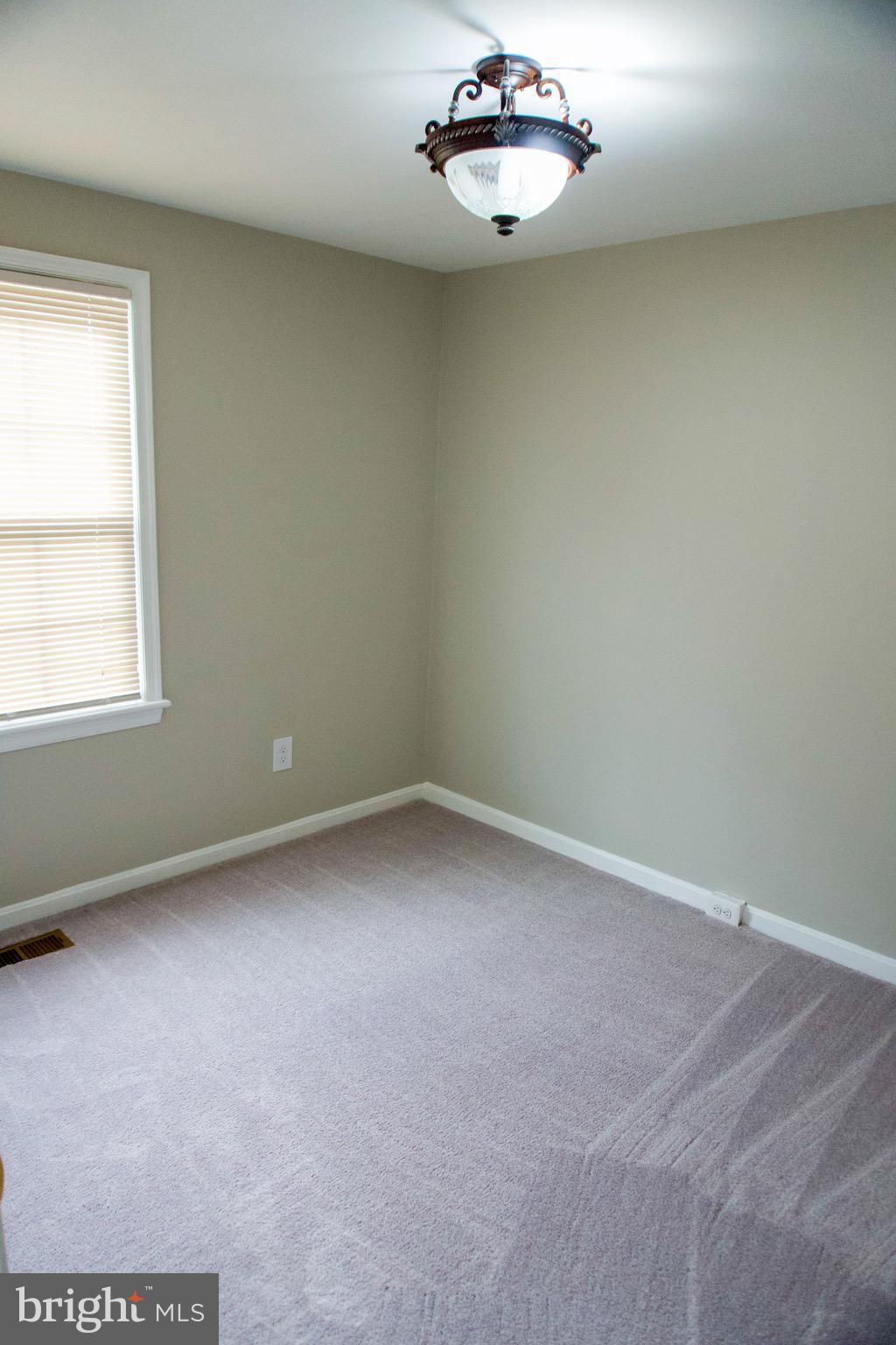 7341 Crestleigh Circle Alexandria, VA 22315 - Photo 18 of 21 an empty room with a window