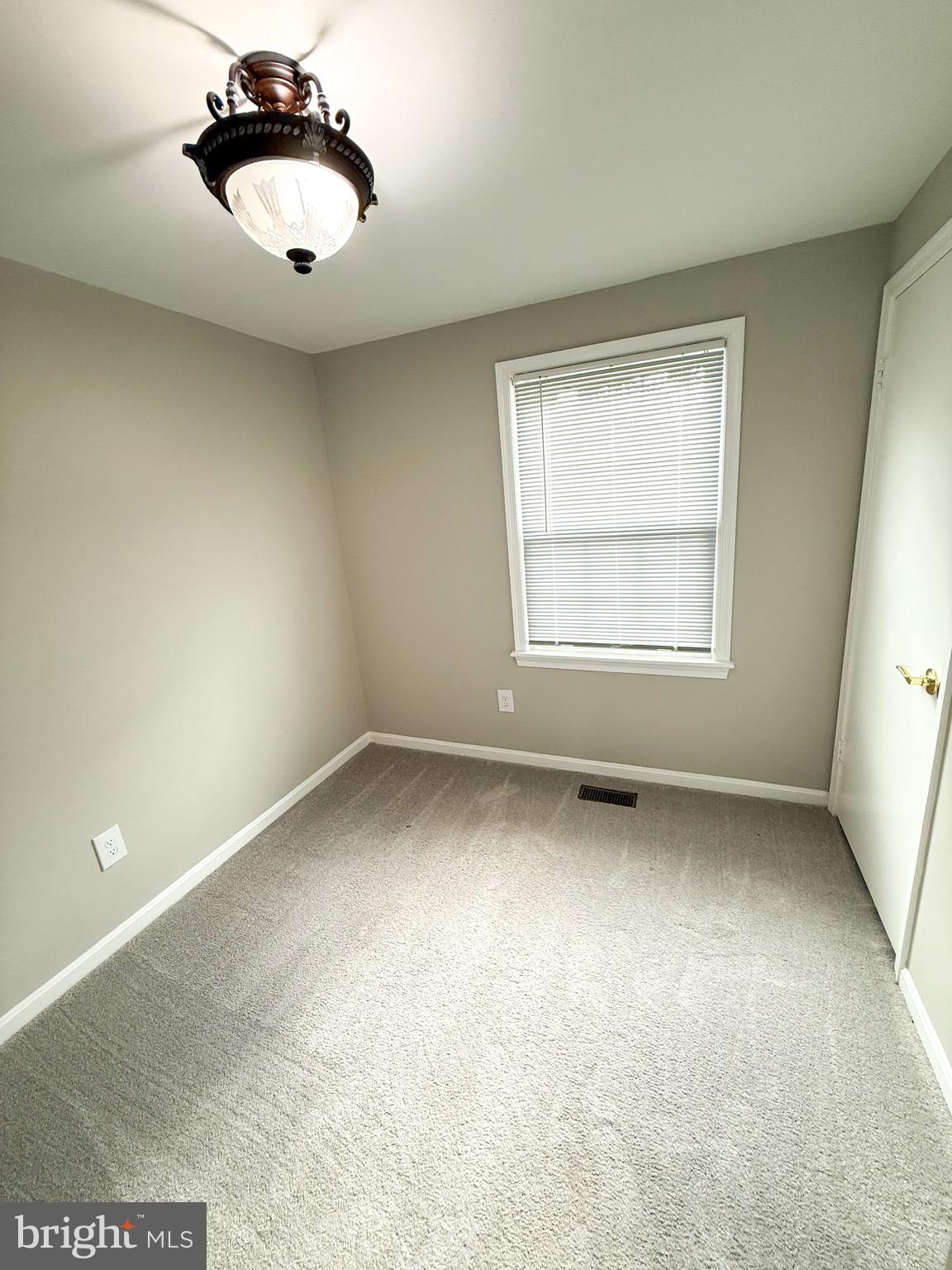 7341 Crestleigh Circle Alexandria, VA 22315 - Photo 19 of 21 an empty room with a window