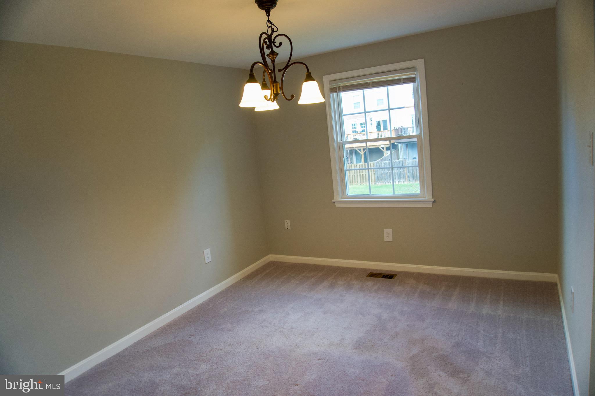 7341 Crestleigh Circle Alexandria, VA 22315 - Photo 4 of 21 a view of an empty room with a window