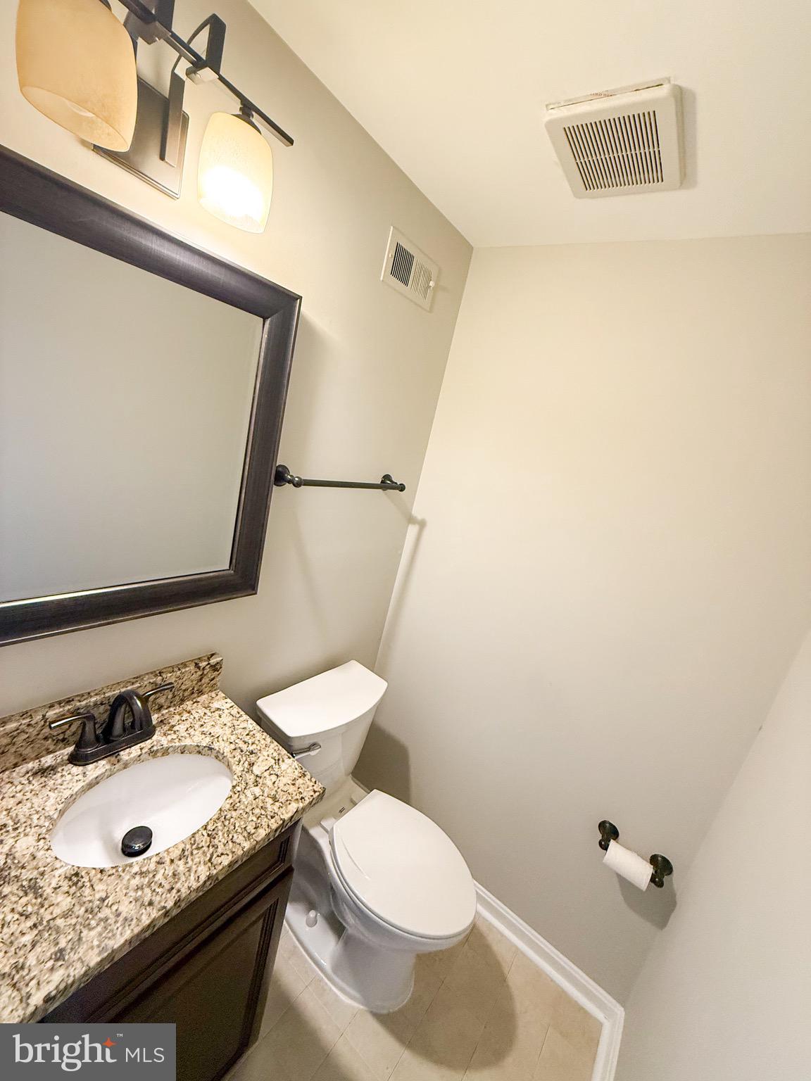 7341 Crestleigh Circle Alexandria, VA 22315 - Photo 8 of 21 a bathroom with a sink and a toilet