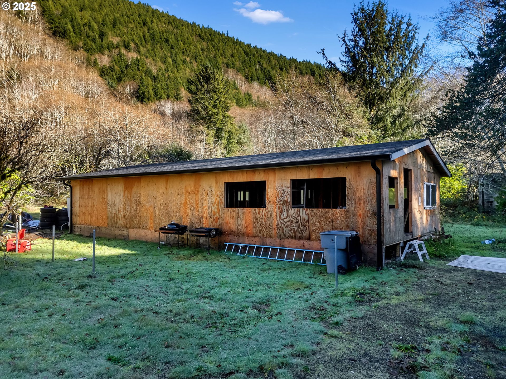 36375 Sunset Highway Seaside, OR 97138 - Photo 11 of 19 a backyard of a house with lots of green space