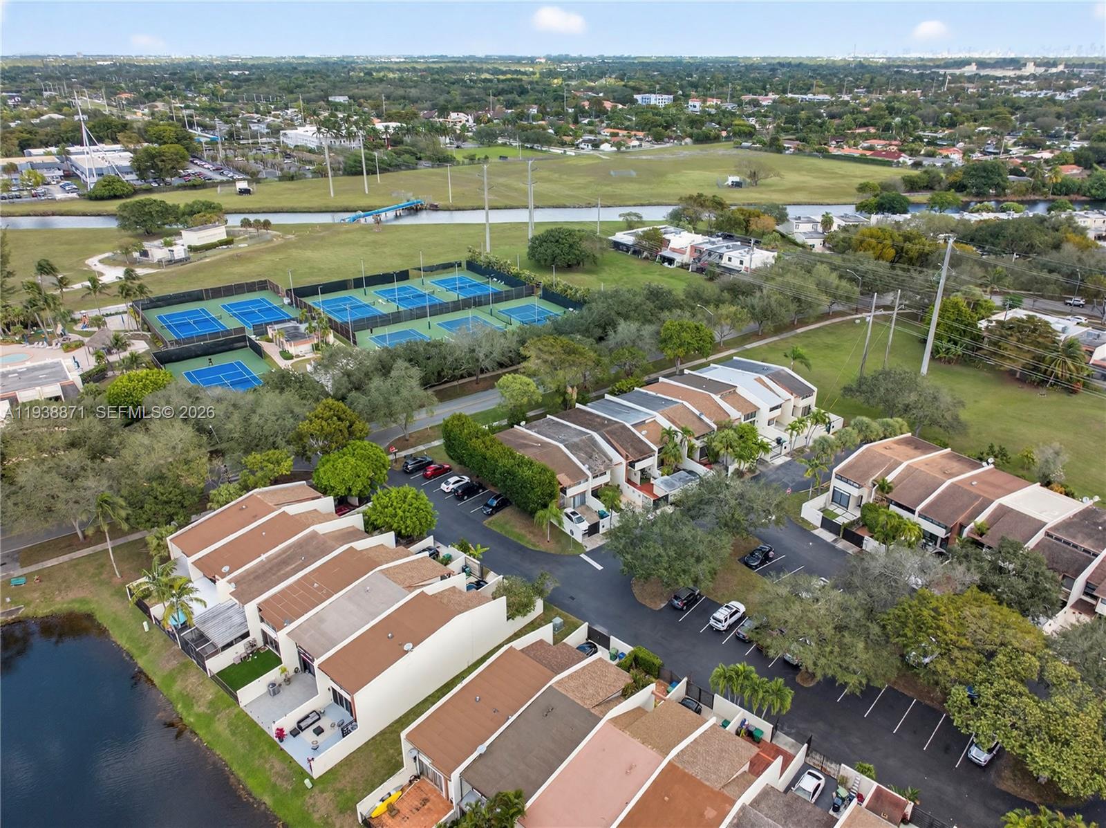 7673 Southwest 103rd Place Miami, FL 33173 - Photo 19 of 20 an aerial view of a city with lake view
