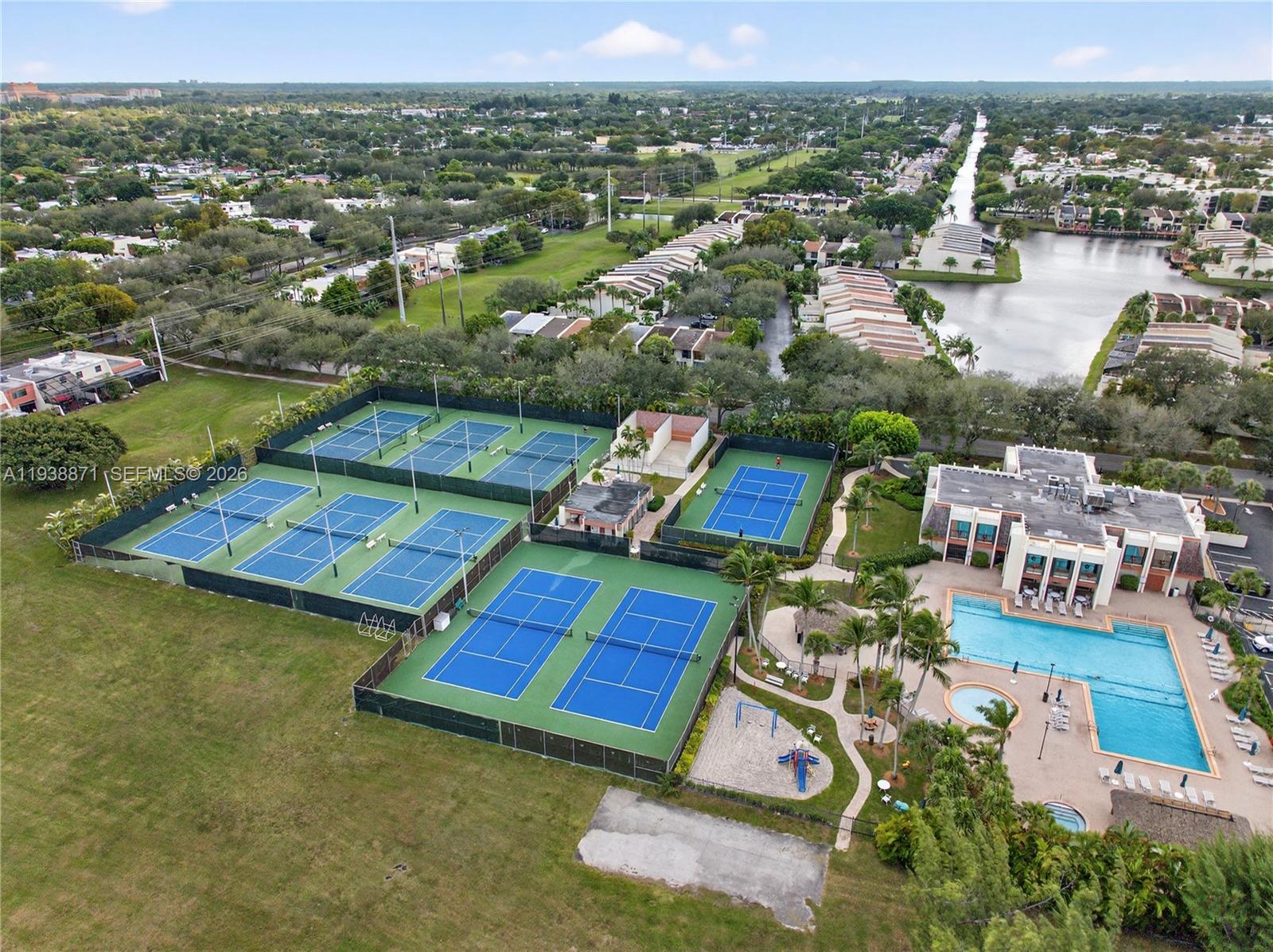 7673 Southwest 103rd Place Miami, FL 33173 - Photo 20 of 20 an aerial view of multiple house with yard