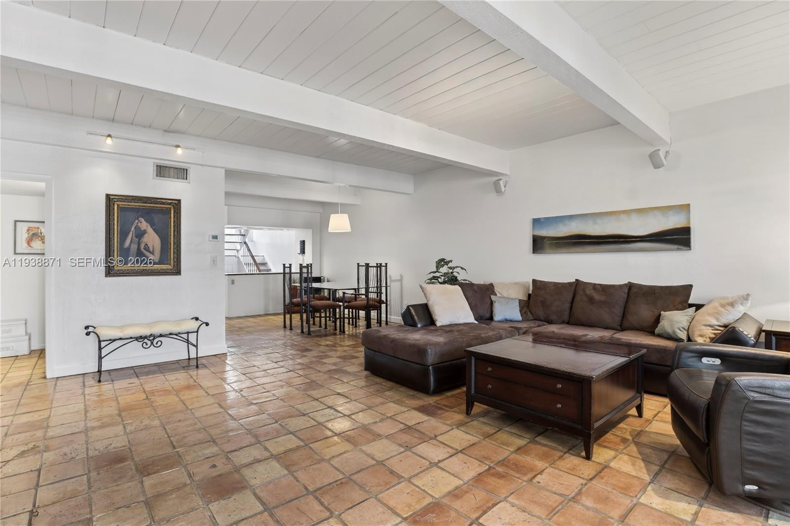 7673 Southwest 103rd Place Miami, FL 33173 - Photo 3 of 20 a living room with furniture and wooden floor