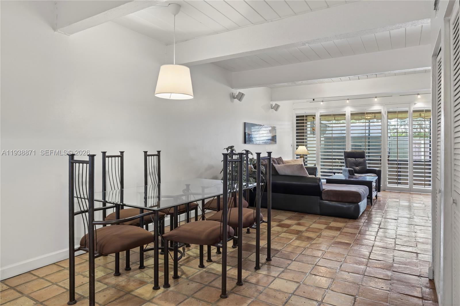 7673 Southwest 103rd Place Miami, FL 33173 - Photo 5 of 20 a living room with furniture