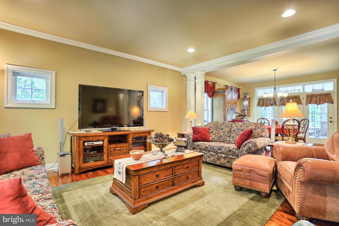 369 Nottingham Road Quarryville, PA 17566 - Photo 14 of 57 a living room with furniture and a flat screen tv