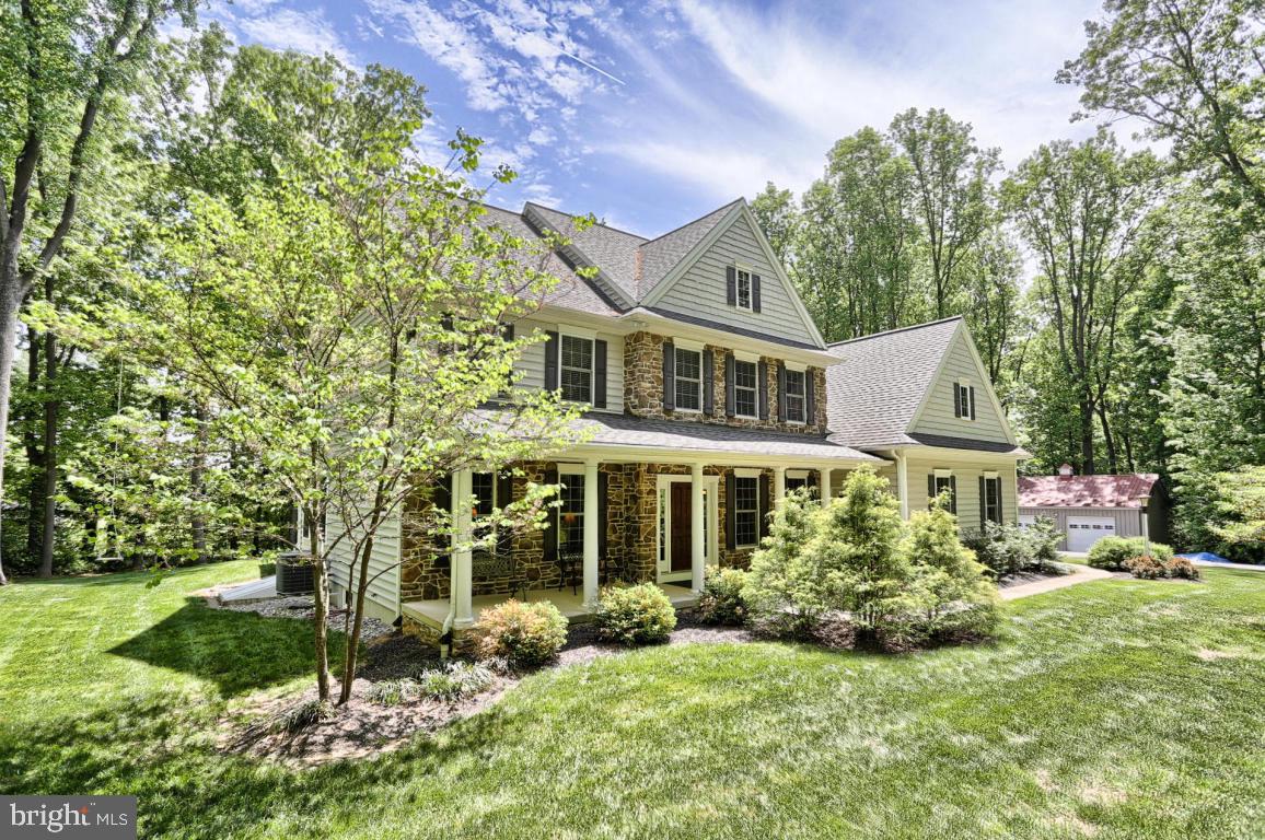 369 Nottingham Road Quarryville, PA 17566 - Photo 4 of 57 a view of a house with a yard and plants