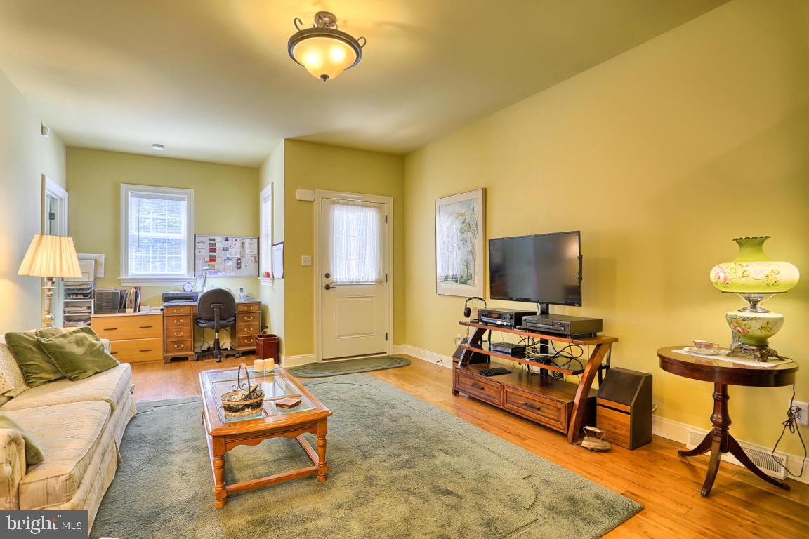 369 Nottingham Road Quarryville, PA 17566 - Photo 33 of 57 a living room with furniture and a flat screen tv