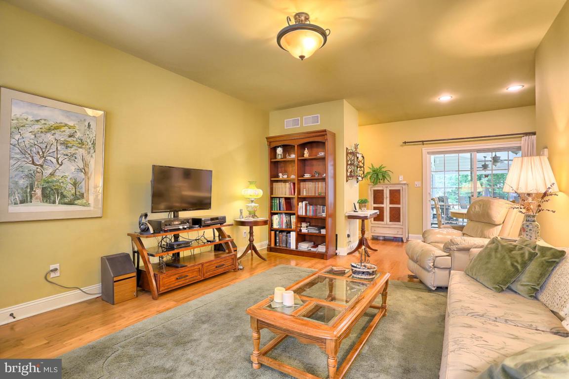 369 Nottingham Road Quarryville, PA 17566 - Photo 36 of 57 a living room with furniture and a flat screen tv