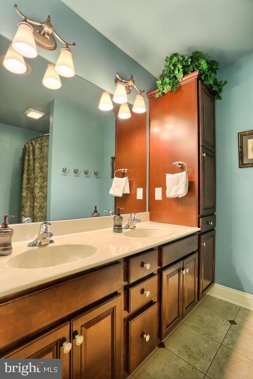 369 Nottingham Road Quarryville, PA 17566 - Photo 44 of 57 a bathroom with a sink vanity and a mirror