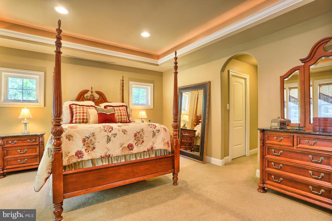 369 Nottingham Road Quarryville, PA 17566 - Photo 49 of 57 a bedroom with a bed and large windows
