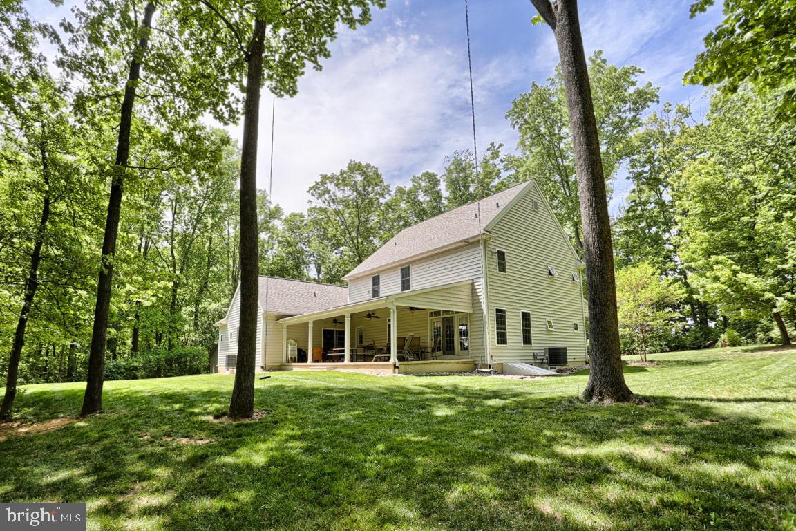 369 Nottingham Road Quarryville, PA 17566 - Photo 7 of 57 a house view with a garden space