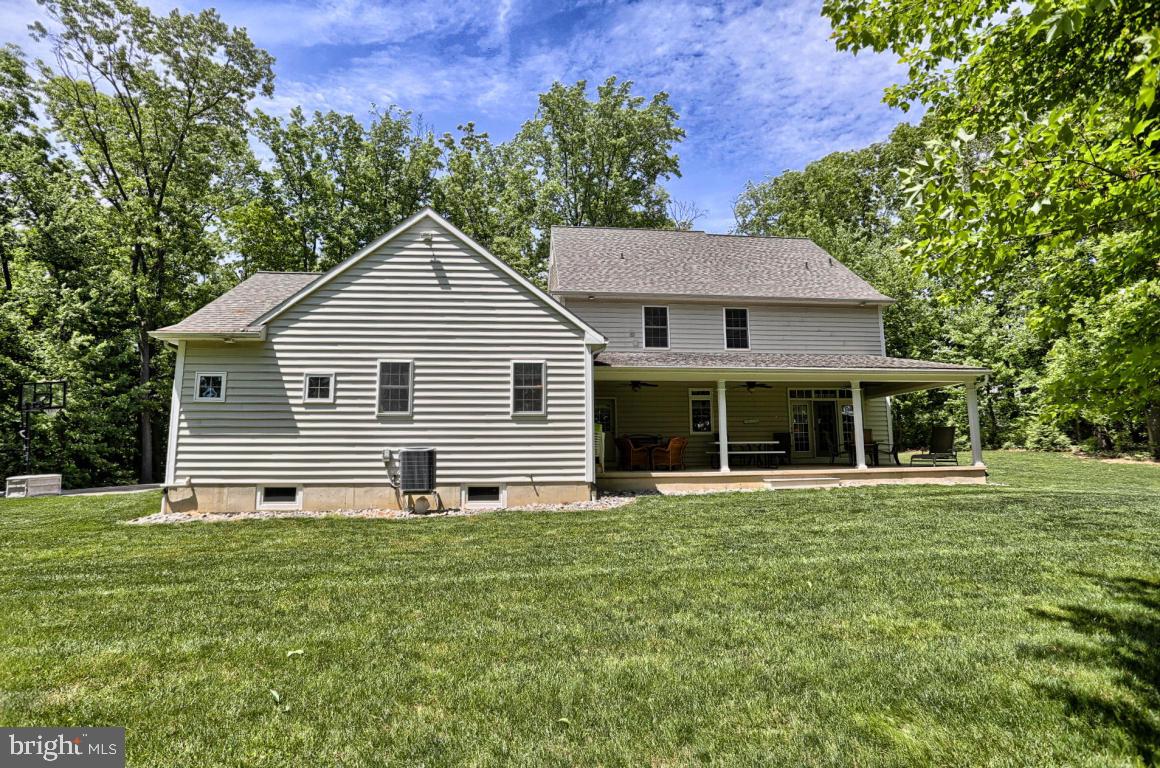 369 Nottingham Road Quarryville, PA 17566 - Photo 9 of 57 a front view of a house with a yard