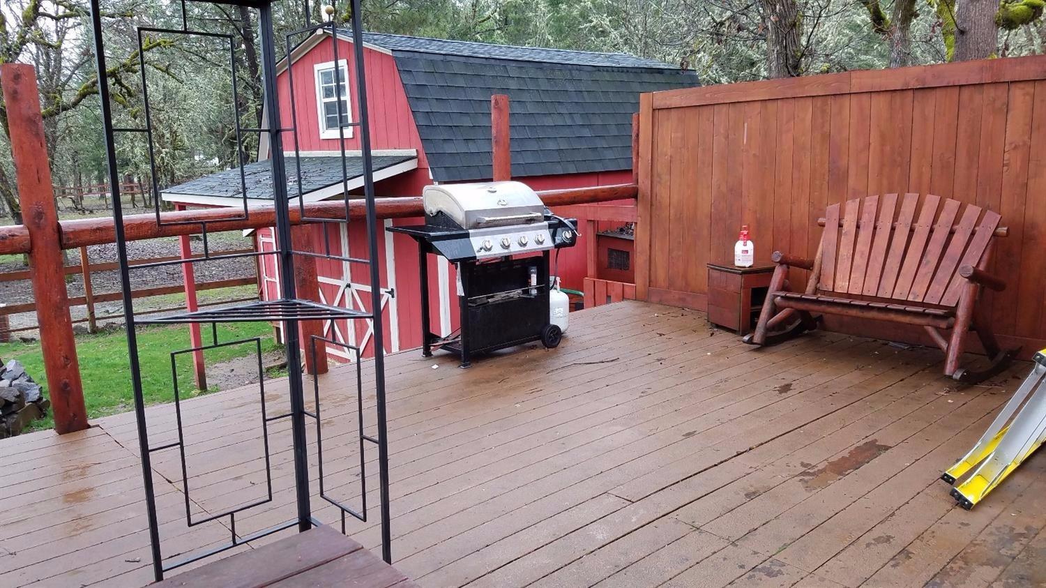 20493 Sawyer Road Shady Cove, OR 97539 - Photo 10 of 18 Deck with small workshop in background