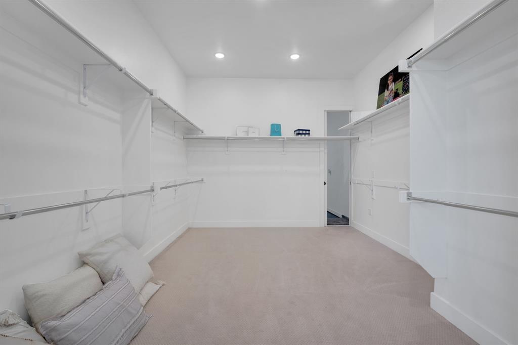 1516 M3 Ranch Road Mansfield, TX 76063 - Photo 24 of 40 Primary closet is huge, designed to give everyone ample space.
