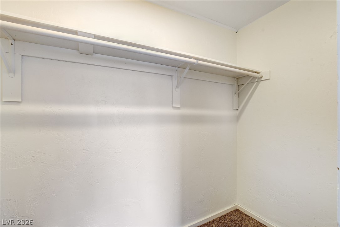 214 West Victory Road Henderson, NV 89015 - Photo 27 of 33 Ample hanging and shelving space awaits in this walk-in closet.