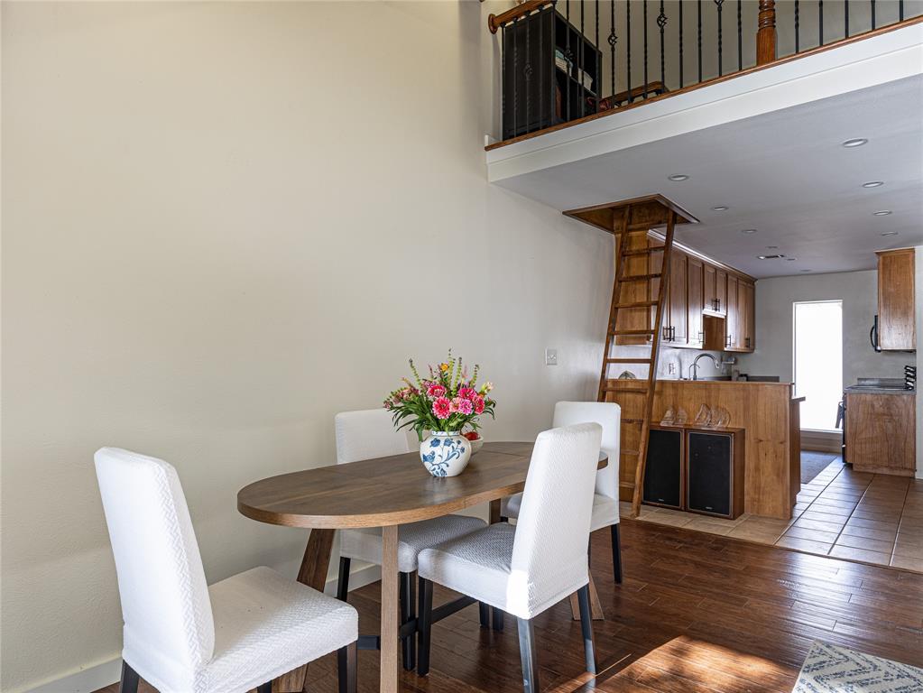 9999 Boat Club Road, Unit 601 Fort Worth, TX 76179 - Photo 9 of 39 Dining area filled with natural light and peaceful views of Eagle Mountain Lake.