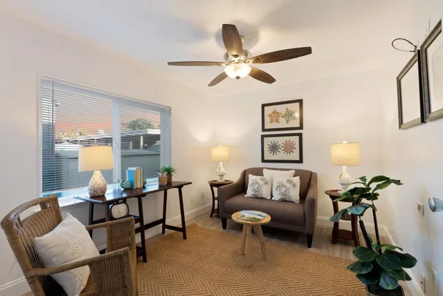 a view of a living room and bathroom