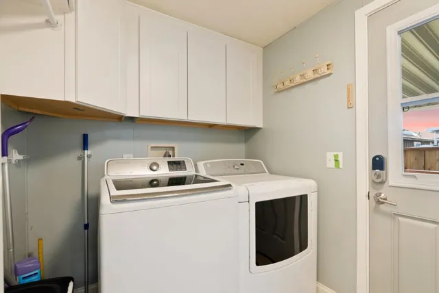 a front view of a house with outdoor seating