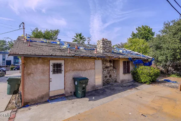 a front view of a house with a porch