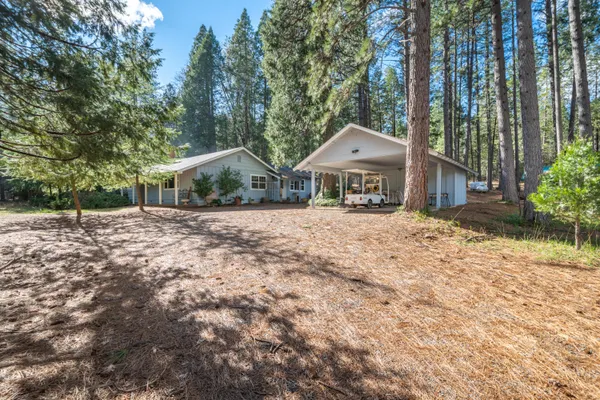 a kitchen with stainless steel appliances granite countertop a stove and a refrigerator