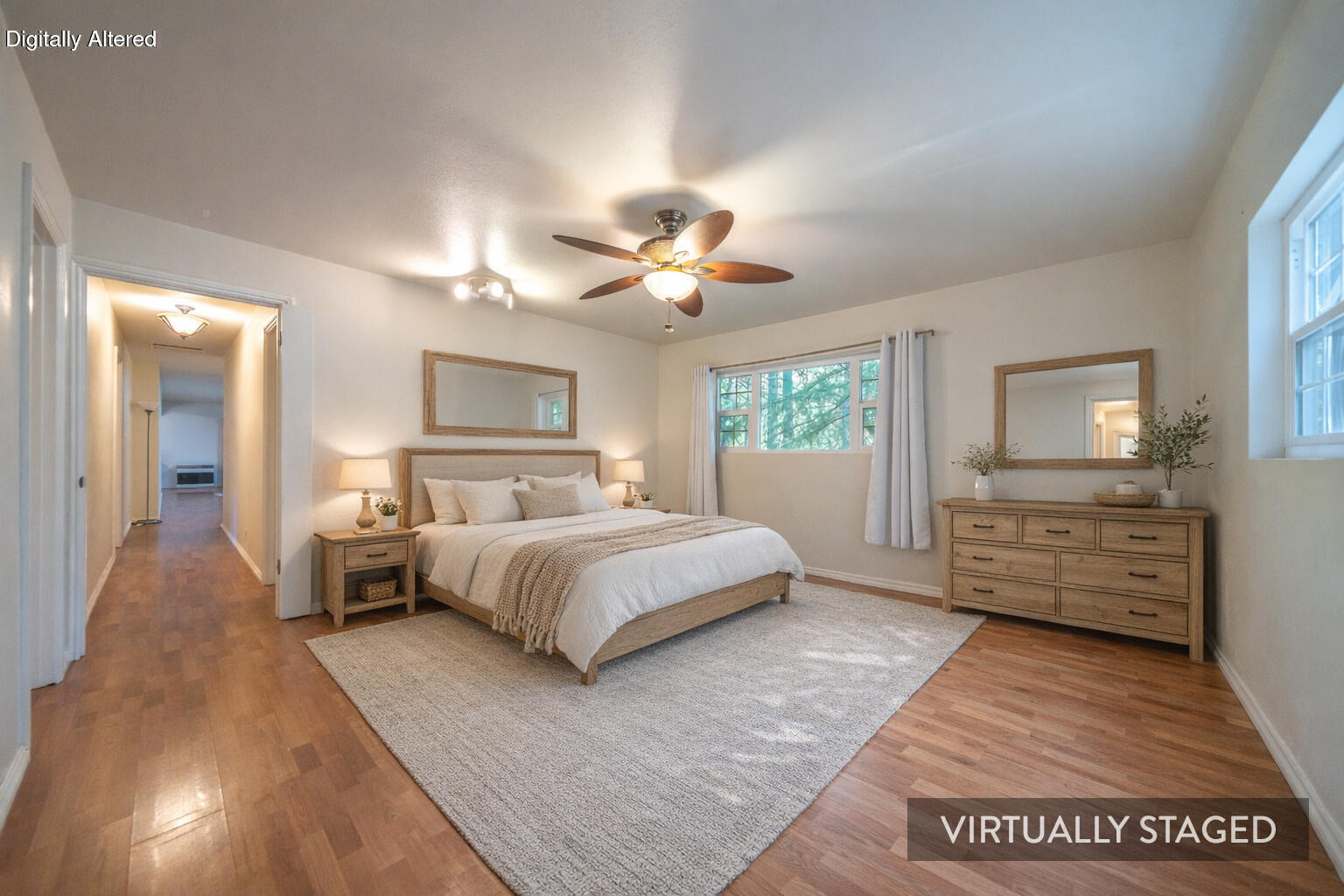 29276 Bullskin Ridge Road Oak Run, CA 96069 - Photo 28 of 113 a spacious bedroom with a large bed a chandelier and closet