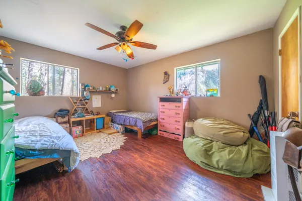 a view of a street with a yard