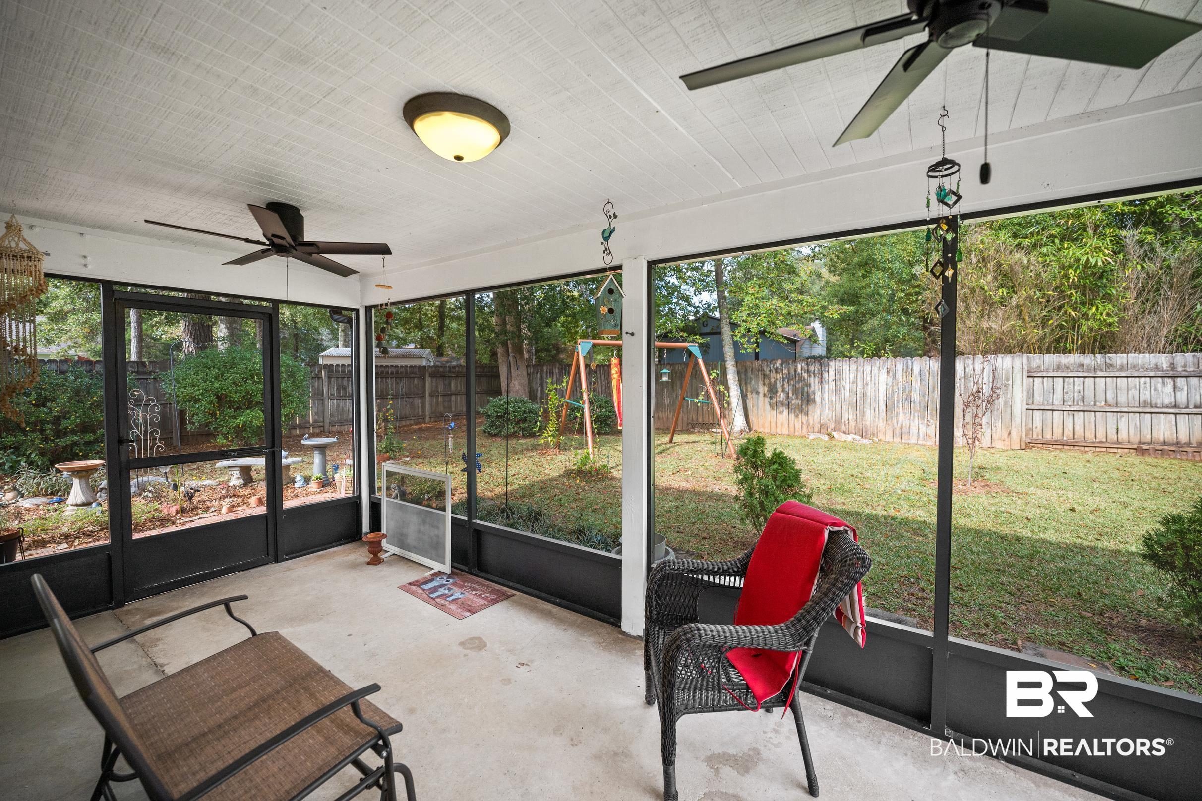123 Dunbar Loop Daphne, AL 36526 - Photo 27 of 33 Sunroom / solarium featuring ceiling fan and plenty of natural light