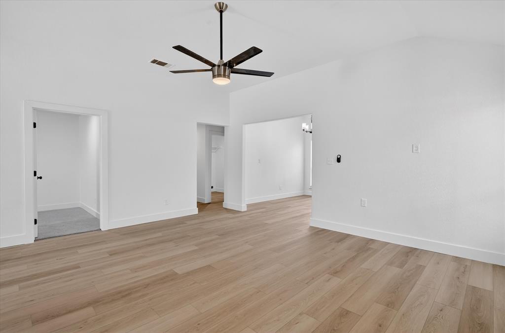 6021 Hartman Road Forest Hill, TX 76119 - Photo 6 of 27 a view of an empty room with wooden floor