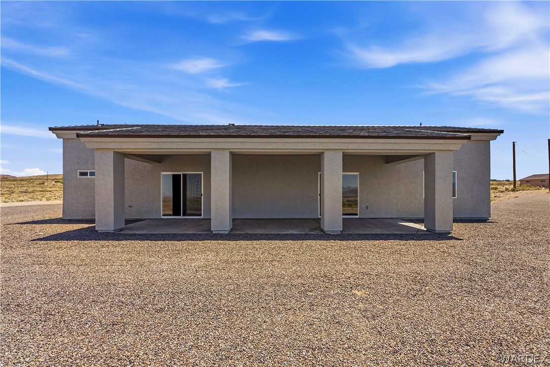 9818 North Cyrus Road Kingman, AZ 86401 - Photo 3 of 42 front view of house