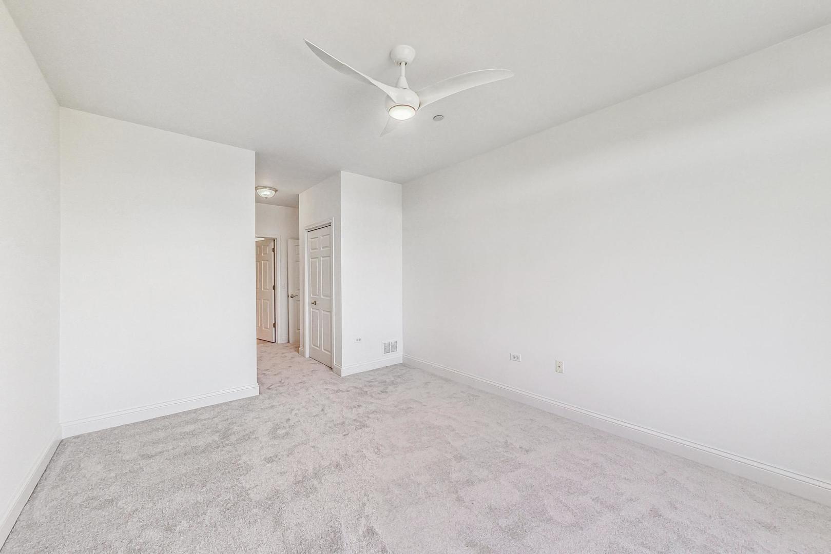 620 McHenry Road, Unit 407 Wheeling, IL 60090 - Photo 11 of 23 a view of an empty room