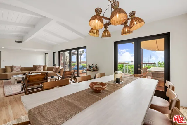 a very nice looking living room with a large window
