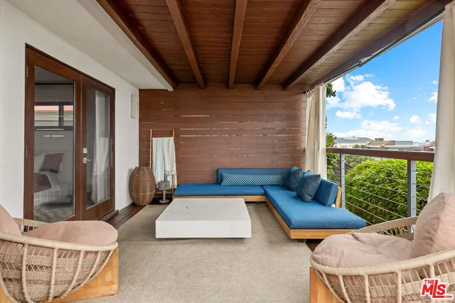 a outdoor space with patio the couches and a dining table with garden view