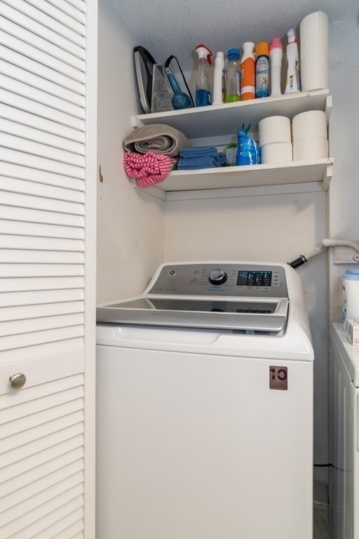 30 Walden Drive, Unit 7 Natick, MA 01760 - Photo 15 of 18 a utility room with washer and dryer