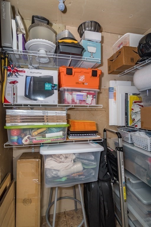 30 Walden Drive, Unit 7 Natick, MA 01760 - Photo 16 of 18 a kitchen with stainless steel appliances granite countertop a stove and a sink