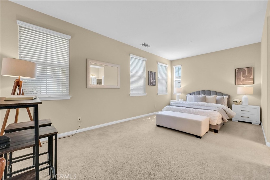3515 Gardenia Lane Brea, CA 92823 - Photo 11 of 46 a spacious bedroom with a bed and a window