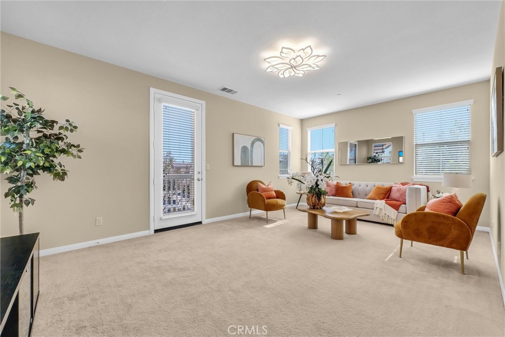 3515 Gardenia Lane Brea, CA 92823 - Photo 14 of 46 a living room with furniture and a chandelier