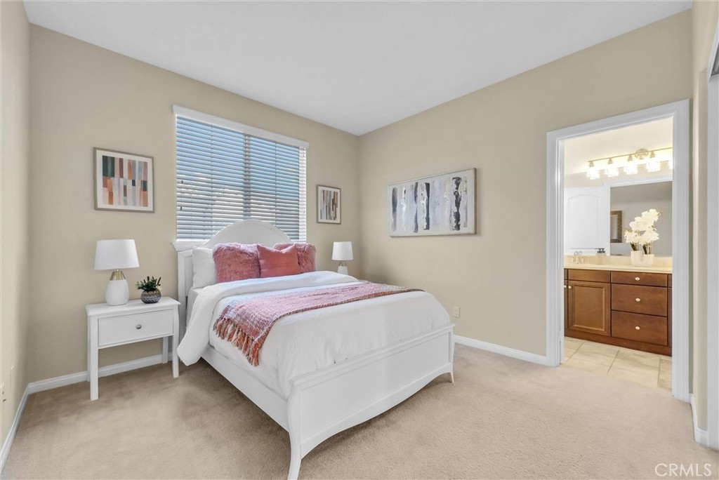 3515 Gardenia Lane Brea, CA 92823 - Photo 19 of 46 a bedroom with a bed and a cabinets