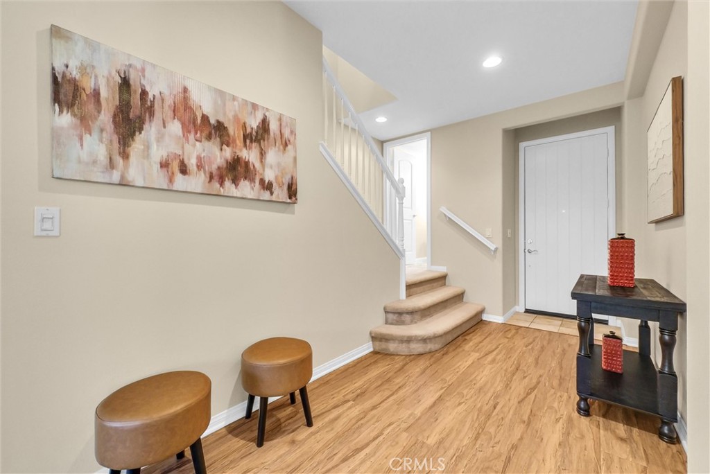 3515 Gardenia Lane Brea, CA 92823 - Photo 3 of 46 a view of a workspace with furniture and wooden floor