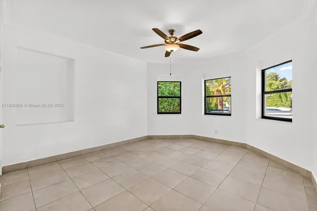 a view of an empty room and window