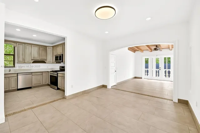 a view of a kitchen with a sink cabinets and a window